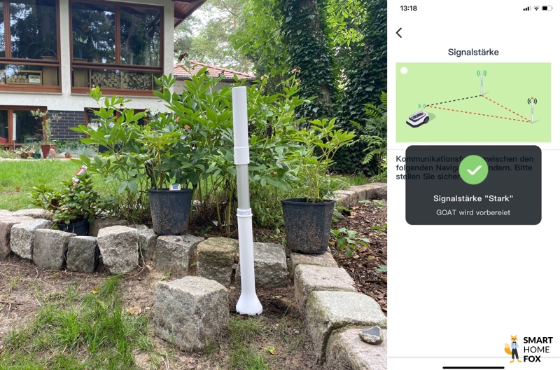 Navigationsbake im Garten installiert und Screenshot der App, dass die Signalstärke stark ist
